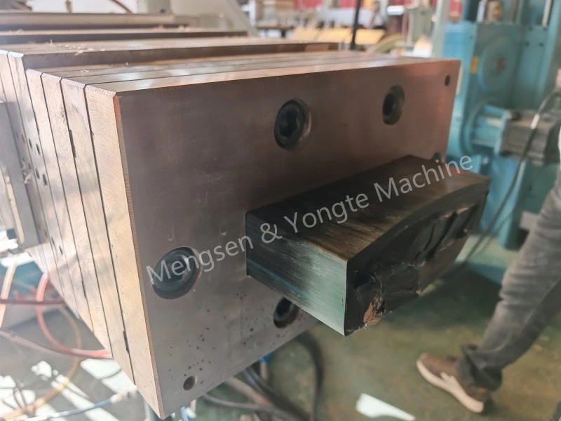 Plastic lumber machine